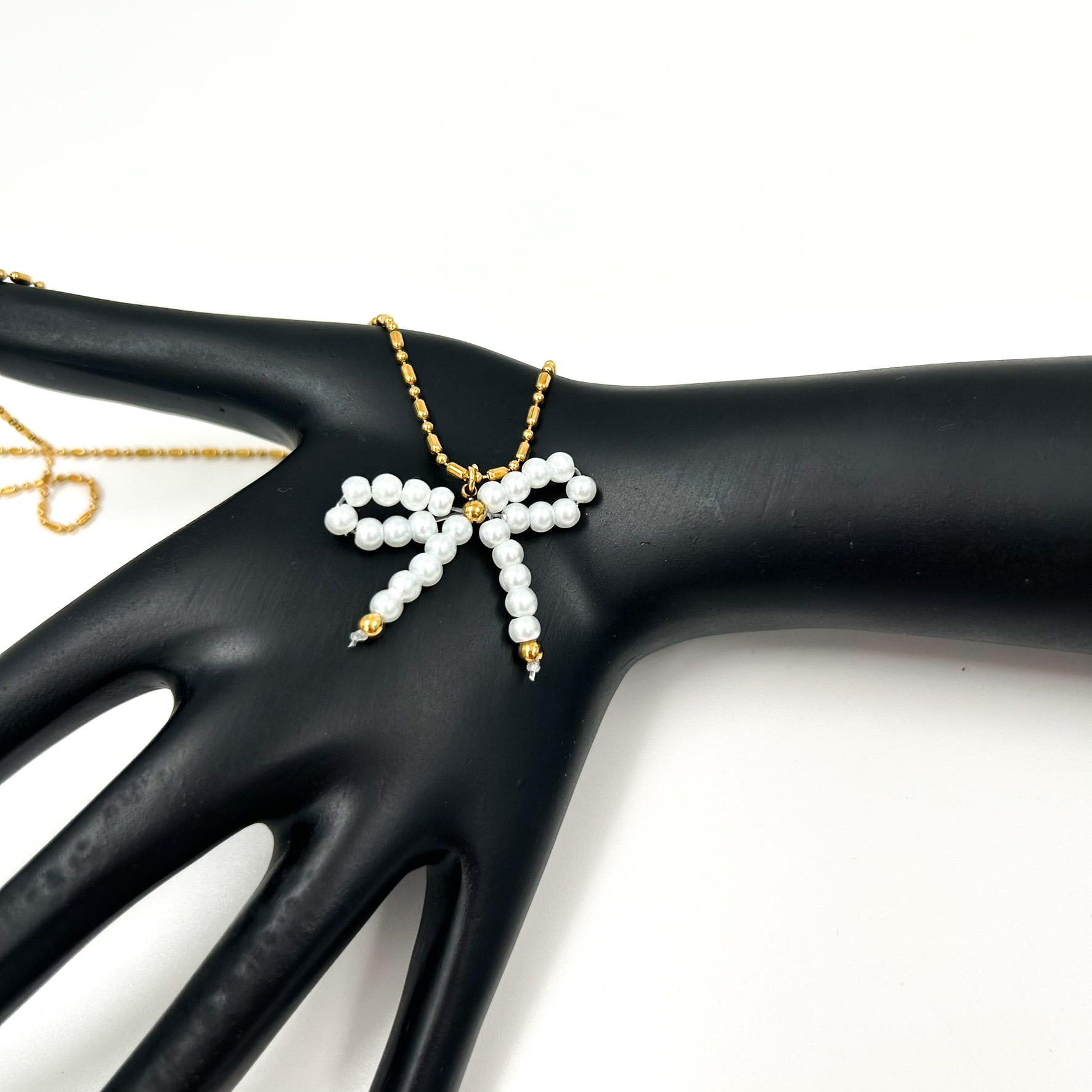 Κολιέ ατσάλινο φιογκάκι με πέρλες χρυσό