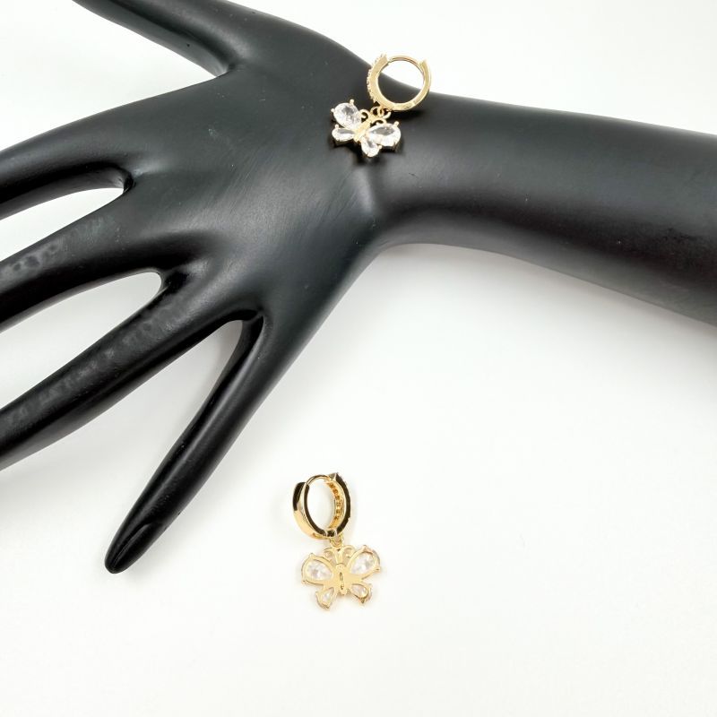 Φωτογραφία από Σκουλαρίκια ατσάλινα κρικάκια χρυσά με πεταλούδα από στρας