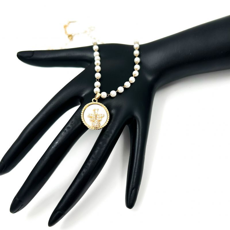 Κολιέ ατσάλινο με πέρλες Φωτογραφία από Κολιέ ατσάλινο με πέρλες