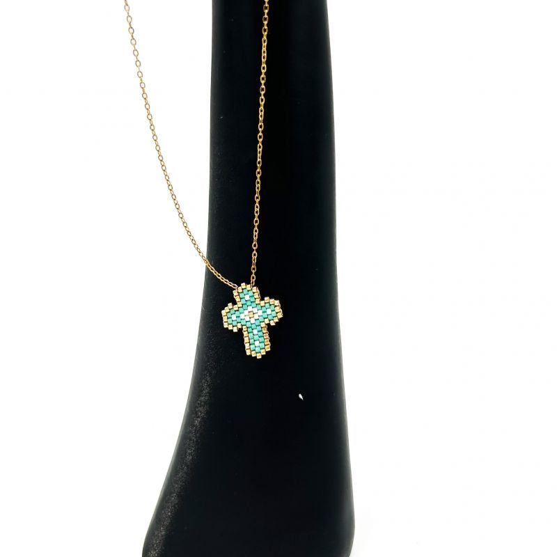Φωτογραφία από Necklace cross blue